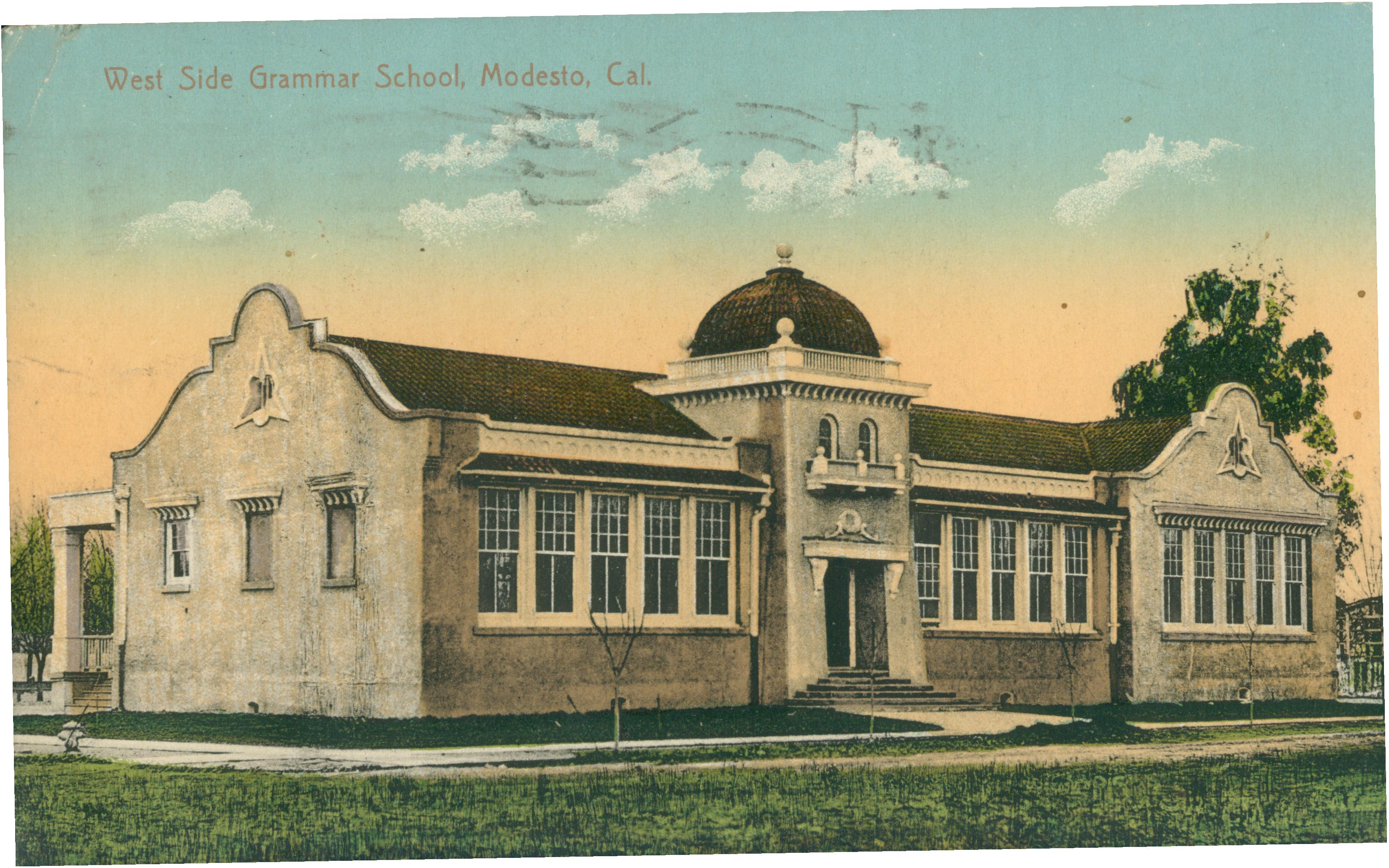 Shows a corner view of the West Side Grammar School
